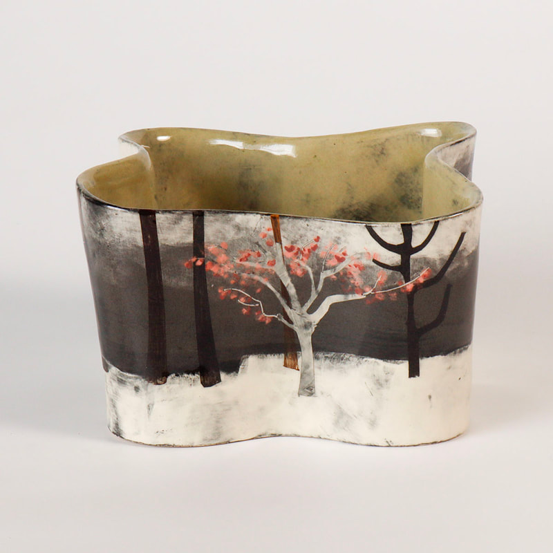 ceramic vessel painted to depict apple trees in blossom