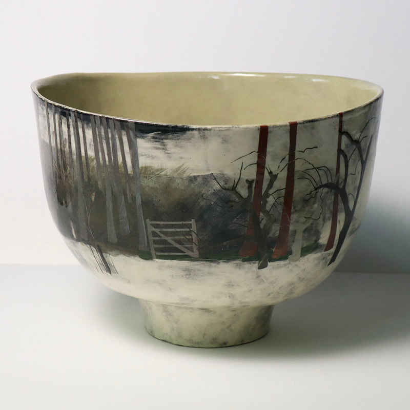Large ceramic bowl painted with woodland image