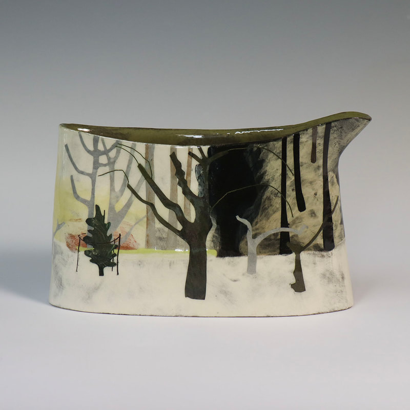 hand built ceramic jug slip painted, depicting orchard