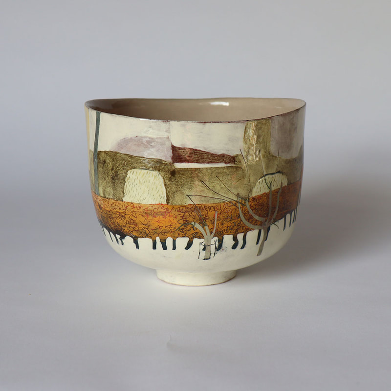 ceramic bowl slip painted to depict a beech hedge and orchard