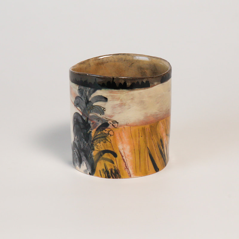 small handbuilt cylinder bowl depicting fields and hedges